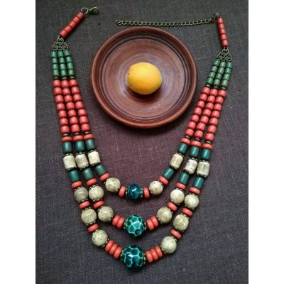 Necklace Patsyorka of ceramic beads colourful 3 threads